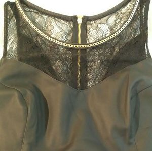 Express small black faux leather and lace top.